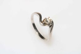 Solitaire diamond ring set in 18 carat twist design white gold, (diamond 0.