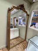 Large arched top gilt framed bevelled wall mirror, 216cm by 127cm.