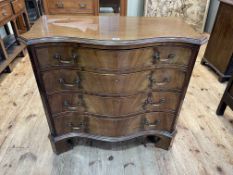 Mahogany serpentine front chest of four long drawers on shaped bracket feet, 82cm by 92cm by 48cm.
