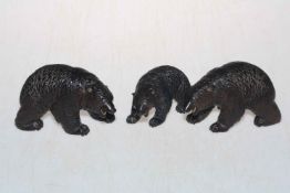 Three Black Forest style bears.