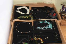 Two boxes of costume jewellery.