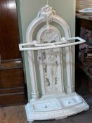 Victorian cast iron stick stand with water carrier figure decoration, 85cm by 49cm by 23cm.