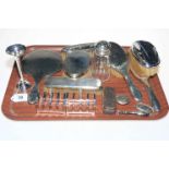 Assorted silver including pair of toast racks, silver backed brushes and mirror, spill vase, sifter,