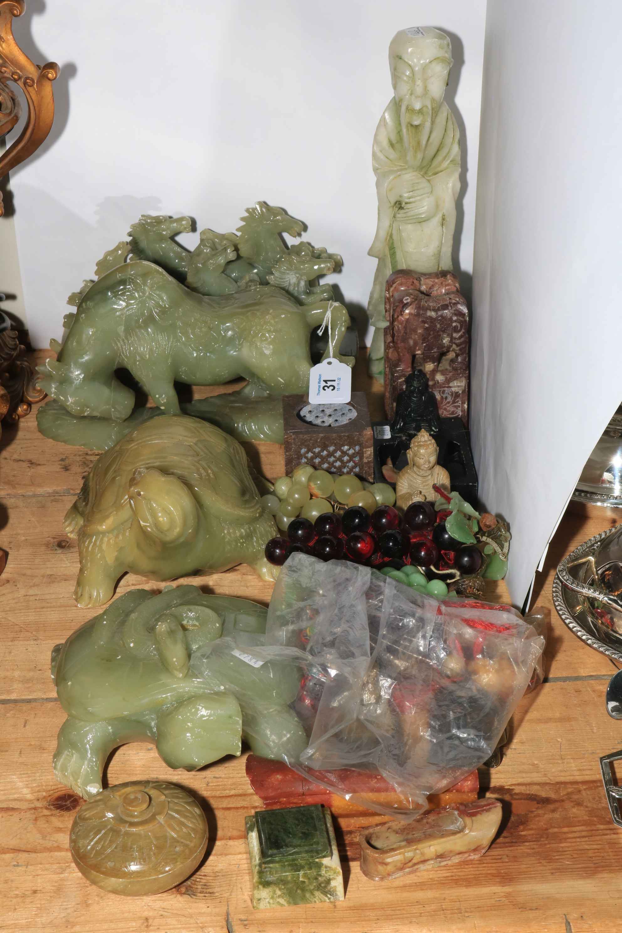 Collection of soapstone including turtles, bull, chariot of horses, elder, etc.