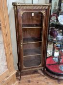 Continental rosewood and gilt mounted marble inset top vitrine, 151cm by 61cm by 37cm.
