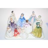 Ten Royal Doulton and one Royal Worcester figures (11).