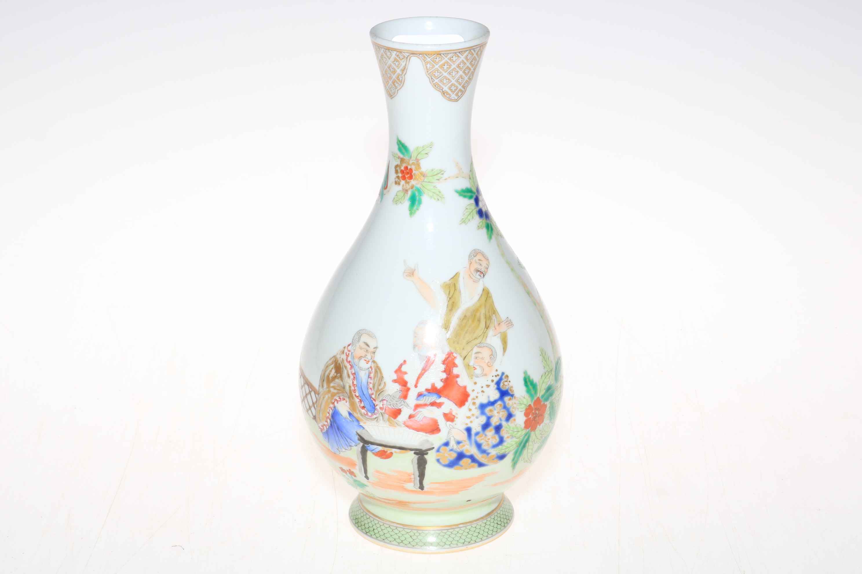 Chinese bottle neck vase decorated with elders, peacock and floral design, 23.5cm high.