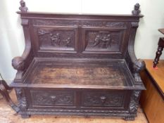 Victorian carved oak box hall bench, 106cm by 122cm by 48cm.