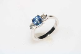 Ceylon sapphire and diamond three stone ring set in 18 carat white gold, size O.