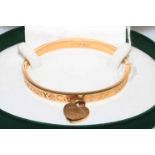 Tiffany & Co gold coloured bangle.