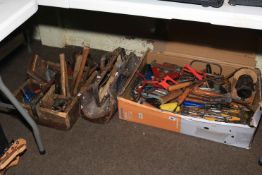 Collection of tools including hand tools.