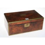 A Victorian walnut and brass bound writing box.