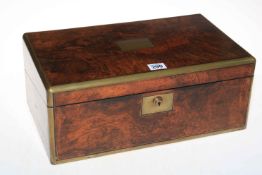 A Victorian walnut and brass bound writing box.
