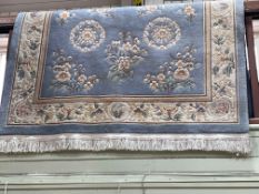 Pale blue ground Chinese rug 2.60 by 1.54.