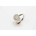 Pear shaped diamond pavé design ring set in 18 carat white gold, size O.