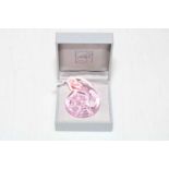 Lalique pink tinted glass pendant, boxed.