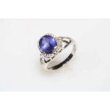 18 carat white gold tanzanite and diamond ring,