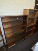 Two two height sliding glazed door bookcases.