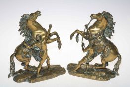 Pair of brass Marley horses, 27cm high.