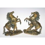 Pair of brass Marley horses, 27cm high.