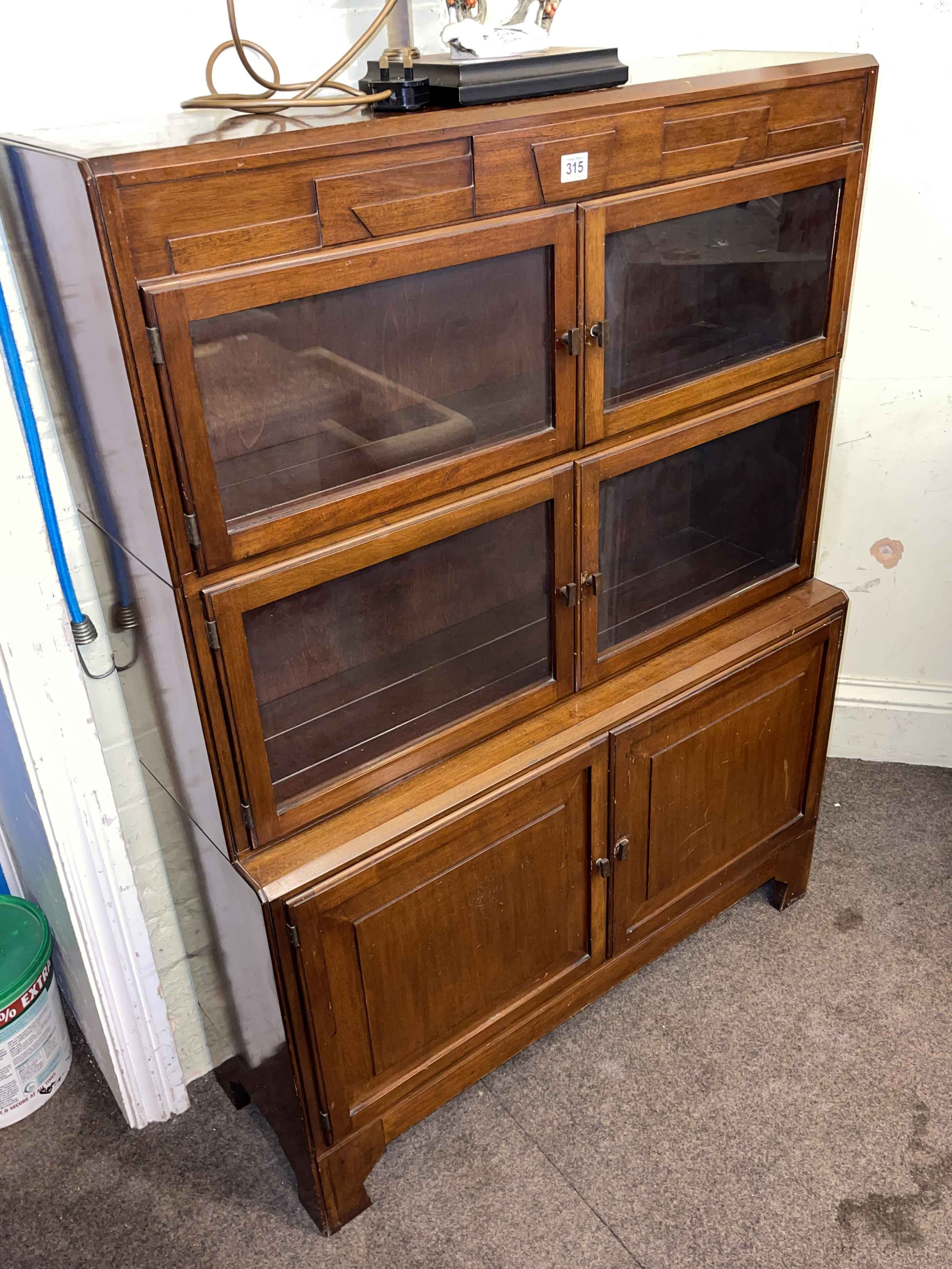 Early 20th Century mahogany three height bookcase and mahogany two door stationery cabinet (2).