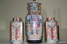 Oriental Chinese table lamp and a pair of vases.