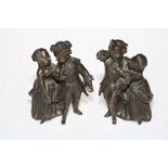 Near pair of 19th Century bronze sculptures of children in period dress.