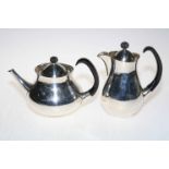 Silver plated teapot and hot water jug designed by Eric Clements for Mappin & Webb.