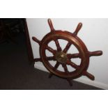 Mahogany and brass ships wheel, 87cm high.