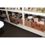 Five boxes of porcelain, glass, sculptures, games, etc.