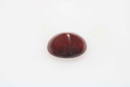Loose cabachon ruby weighing approximately 20 carats.