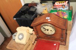 Cameras and lenses, Bakelite telephone, Action Man, mantel clock, annuals, etc.