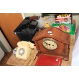 Cameras and lenses, Bakelite telephone, Action Man, mantel clock, annuals, etc.