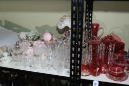 Collection of ruby glass including a pair of lustres, baskets, vases,