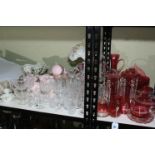 Collection of ruby glass including a pair of lustres, baskets, vases,