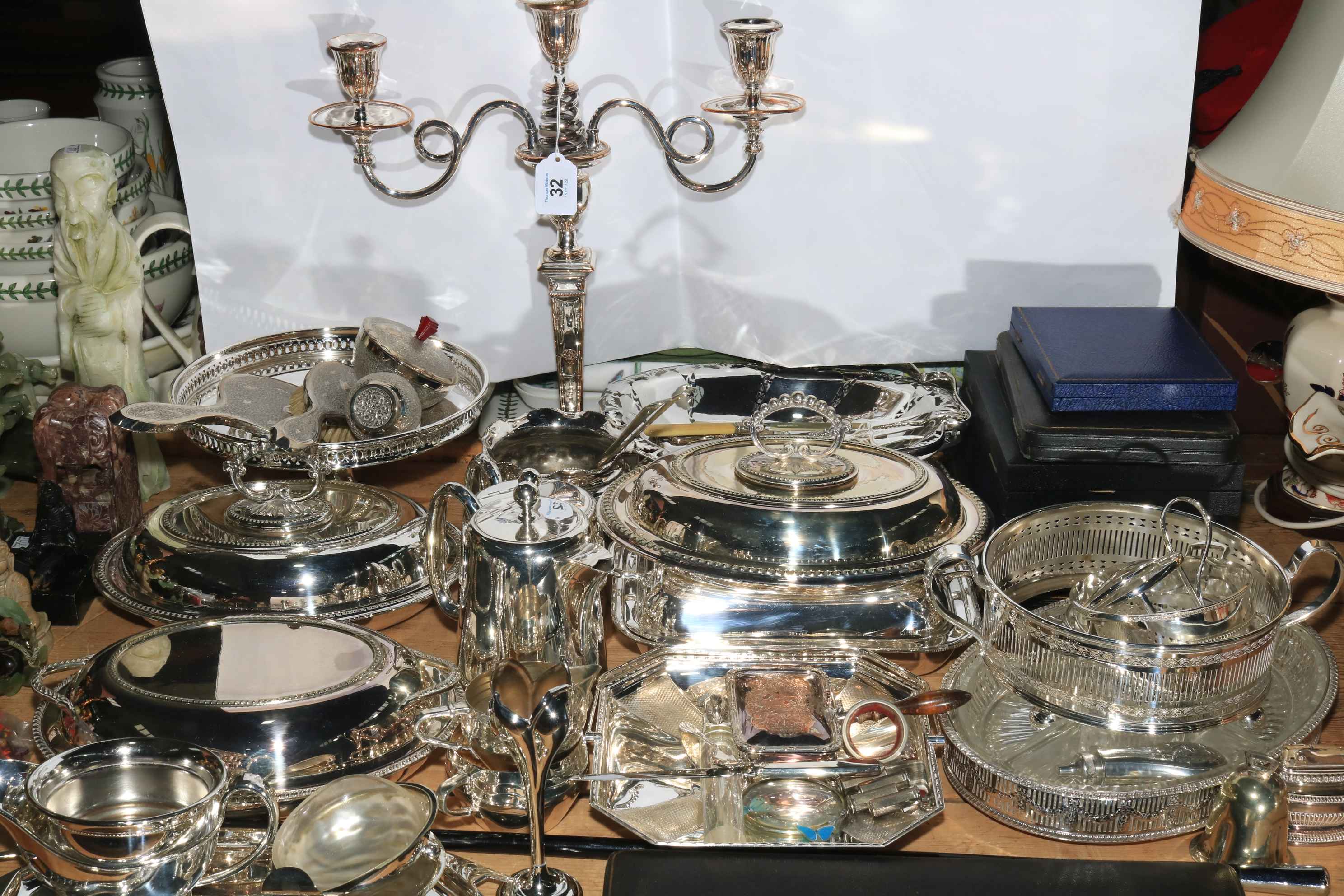 Collection of silver plated wares including cased cutlery, tureens, candelabra, etc.