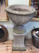Large weathered garden urn on pedestal stand, 102cm by 62cm diameter.