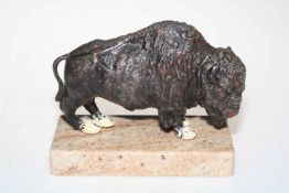 Metal cold painted model of an American Bison on a marble stand.