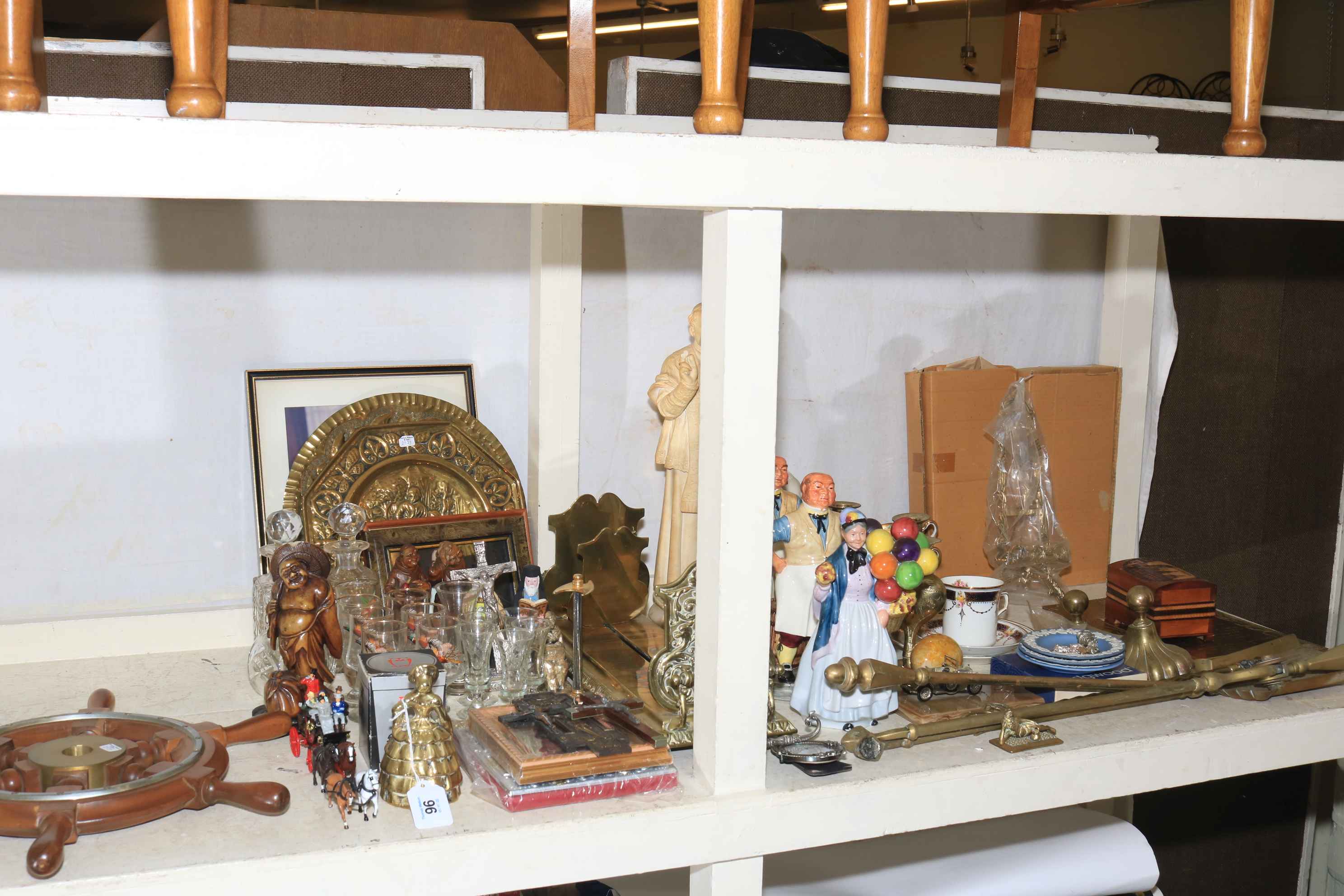 Ornate brass book trough, figurines, metalwares, Parian ware busts, glass, ships wheel, etc.