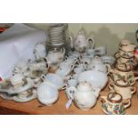 Collection of Japanese Oriental porcelain including teapots.