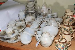 Collection of Japanese Oriental porcelain including teapots.