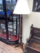 Mahogany reeded column tripod standard lamp and silk shade.