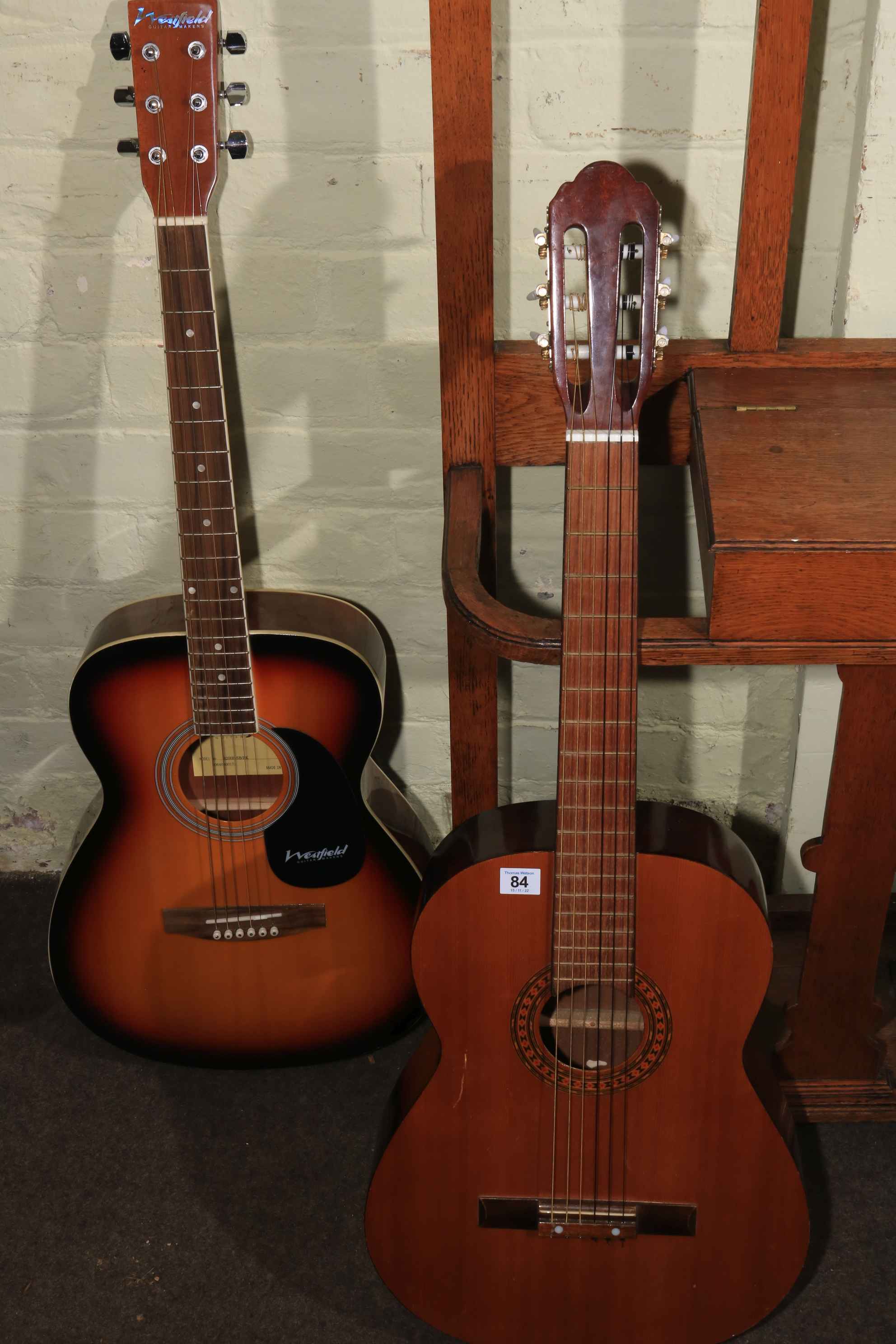 Two guitars including Westfield and Lorenzo.