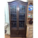 Early 20th century leaded glazed four door bookcase, 194cm by 90cm by 30cm.