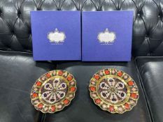 Two Royal Crown Derby Imari scallop edged plates, 1128, boxed.