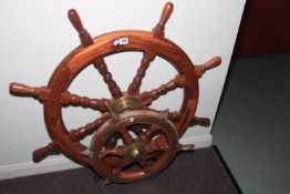 An eight spoke and a six spoke ships wheels, 52cm and 86cm (2).