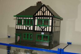 Dolls house with furniture.