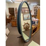 Pair oval adjustable shop mirrors.