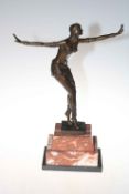 Art Deco style bronze of dancing lady on marble plinth, 65cm high.