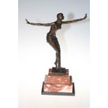 Art Deco style bronze of dancing lady on marble plinth, 65cm high.